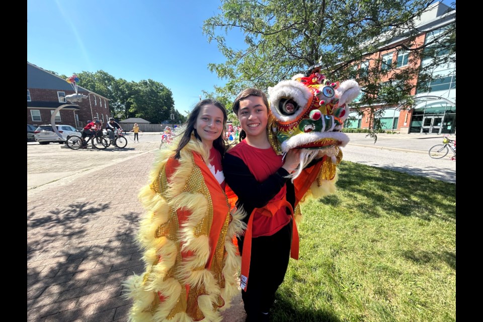 Canada Day in Collingwood July 1, 2024, with Camille Castillo Buehler pictured at right. 