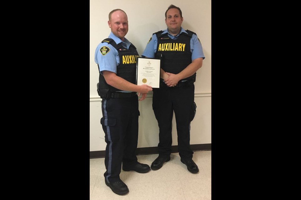 L to R: Auxiliary Constable, Shane Bond and Auxiliary Sergeant, Matt Van Gerven. Photo supplied by the Ontario Provincial Police

