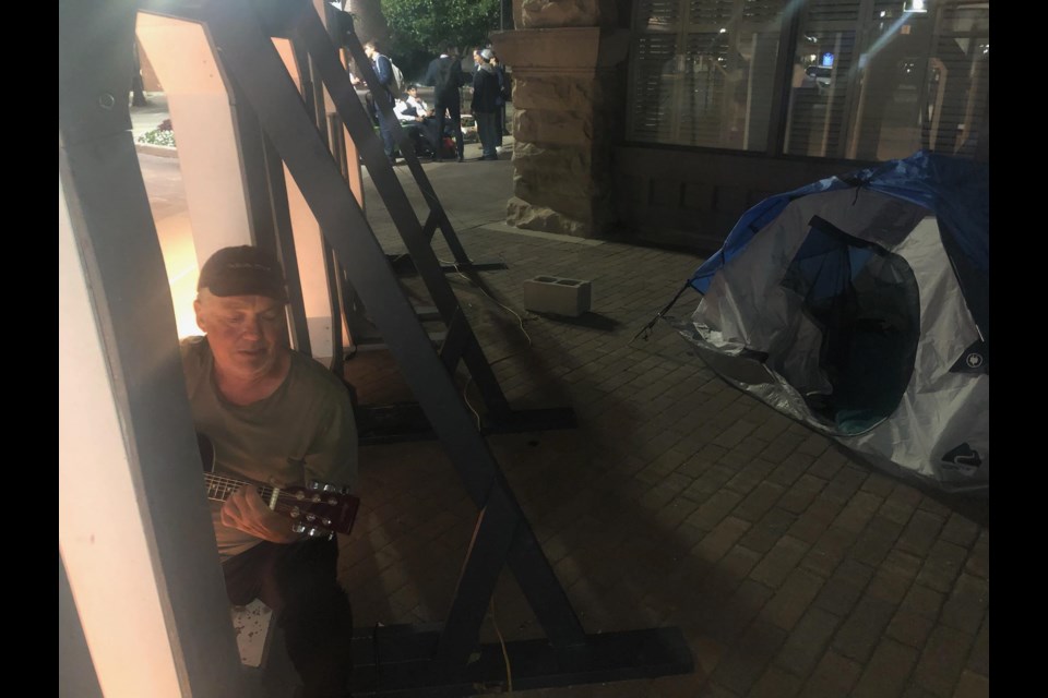 Dave Fish holds a one-person protest outside of Collingwood town hall on Sept. 1 to draw attention to homelessness in Collingwood.