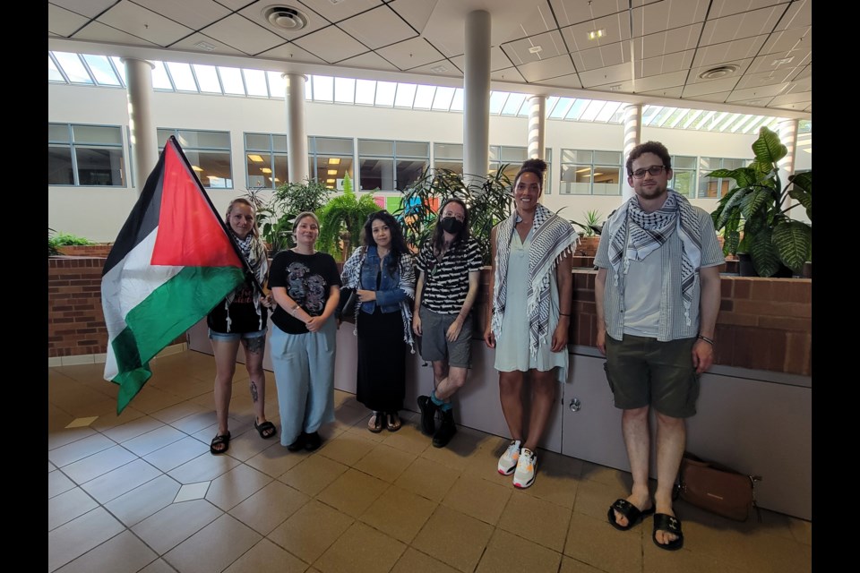 Sporting keffiyehs and carrying a Palestinian flag, protestors attended this week's Simcoe County District School Board regular meeting to protest Parents Against Racism Simcoe County being denied a delegation during the meeting.