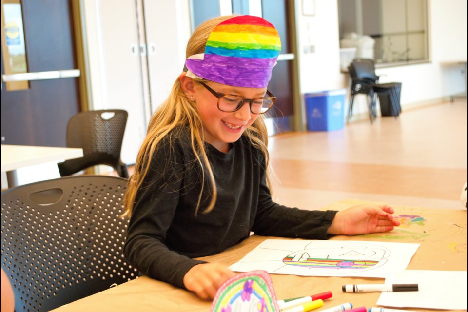 Lola Gold, 6, colours her abstract Picasso-style self portrait during Collingwood Museum's day camp on Tuesday, Aug. 6. Jessica Owen/CollingwoodToday