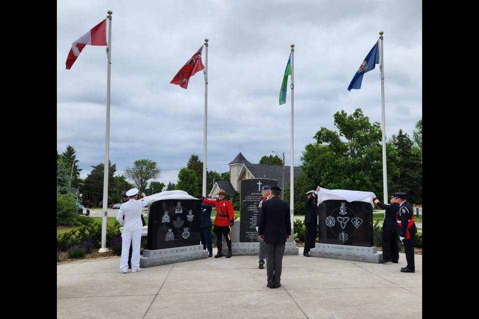 Representatives from Canadian military services and first responders unveiled the new monuments.