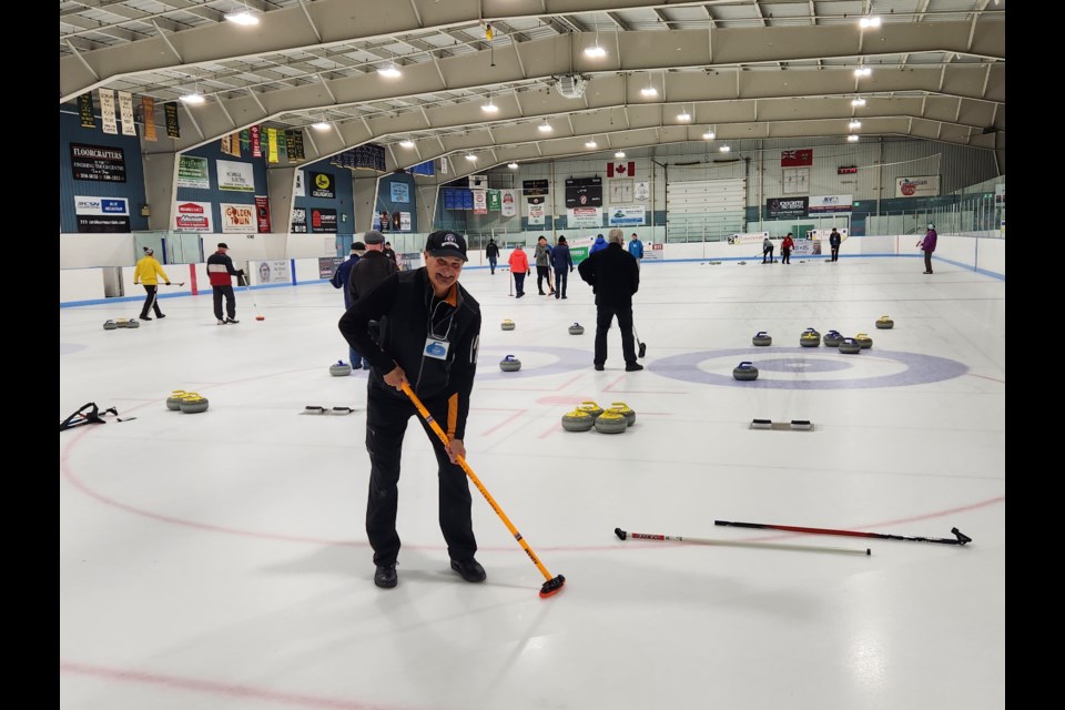 The Blue Mountains Curling Centre President Lloyd Luckock on the ice on the first day of curling season in Thornbury.