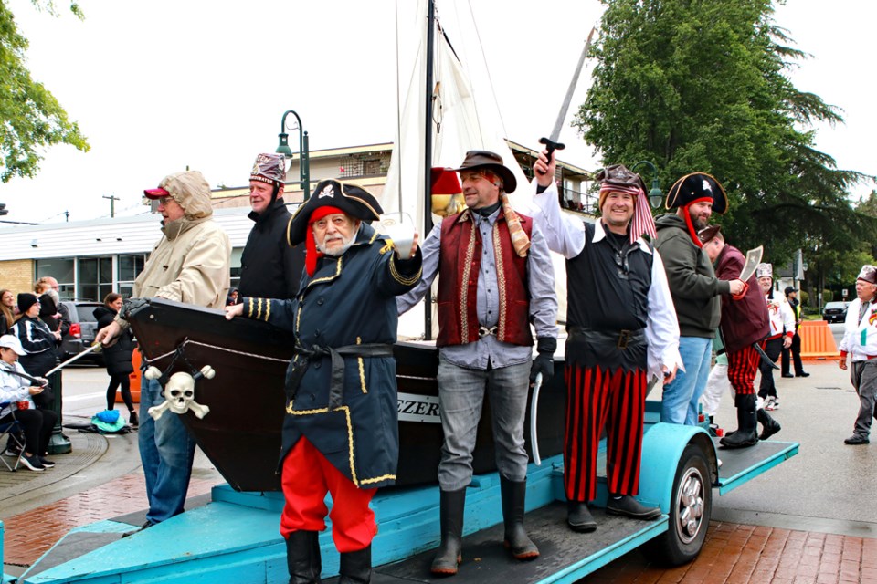 The rainy weather didn't dapen the spirits of those taking part in or watching the annual May Days parade in Ladner Village. The crowds made their way over to Memorial Park in Ladner to enjoy more entertainment, the food vendors and the midway.