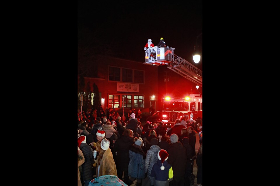 Santa paid an early visit to Ladner Village on Thursday night, Nov. 28 with the help of the Delta Fire Department. Santa was on hand to help light the Christmas tree as part of the annual Ladner Business Association Christmas Tree Festival.