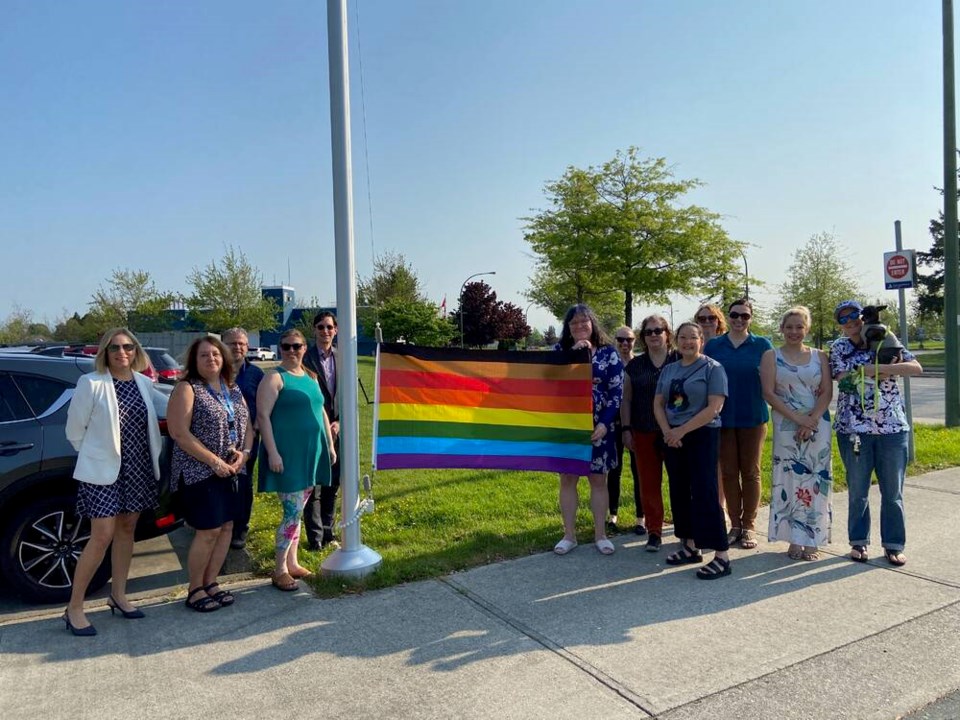 web1_pride-flag-raised-at-school-district