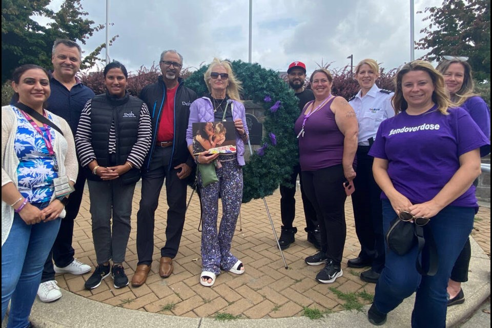 City of Delta councillors, Delta Police joined with members of the Delta Overdose Community Action Team at a vigil outside the North Delta Centre for the Arts on Aug. 31. Mike Su Photo 