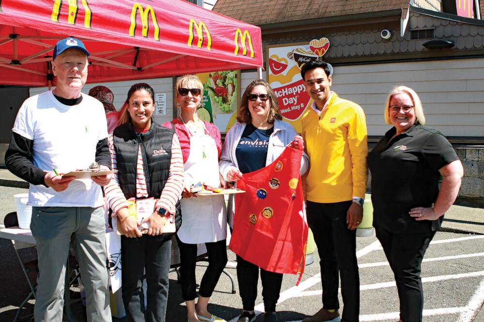 Pictured left to right; Denis Horgan (chair, Reach Foundation); Delta Coun. Jennifer Johal; Tamara Veitch (Reach events coordinator); Lisa Margetson (director, Reach Foundation); Nauman Jutt (owner/operator South Delta McDonald’s Restaurants) and Jill McKnight (executive director of the Delta Chamber of Commerce) outside the Ladner McDonald’s on McHappy Day. Jim Kinnear Photos 