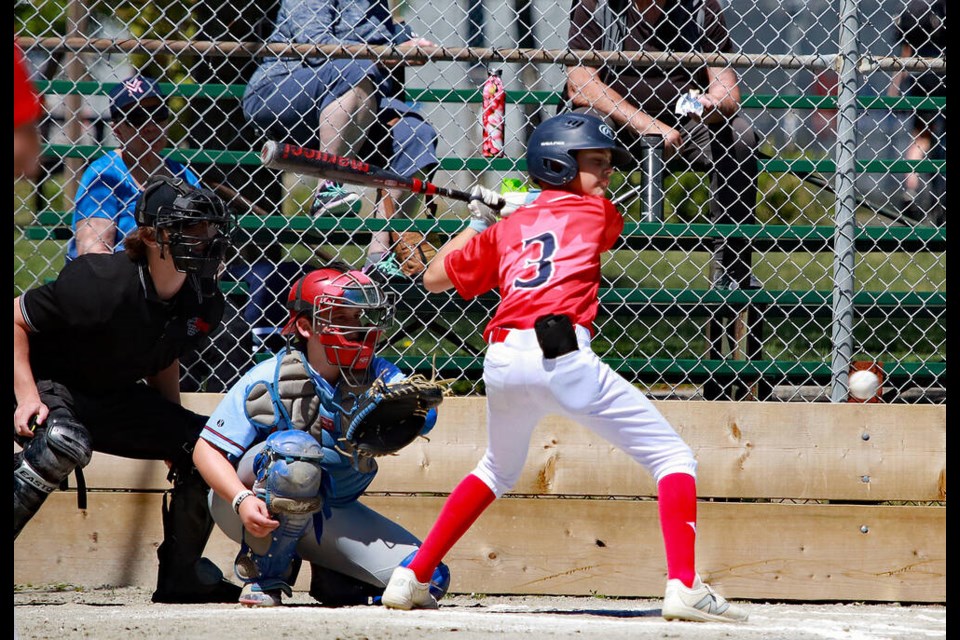 The Ladner Red Sox lost in the semifinals in the peewee division at the Kyle Losse Memorial Tournament over the weekend. Pictured is action from a round robin game against Vancouver. Jim Kinnear Photo 