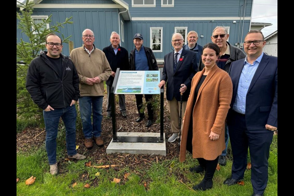 Participating in the 65th Anniversary trees and shrubs planting dedication ceremony were (l to r) Delta Councillor Dylan Kruger, Delta South MLA Ian Paton, Denis Denischuk, Walt Hayward, President David Rushton, Glyn Abraham, Global Container Terminals (GCT) Manager, Corporate Affairs Jennifer Perih, Richard Shantz and GCT Vice President, Public Affairs Marko Dekovic. Ladner Rotary Photo 