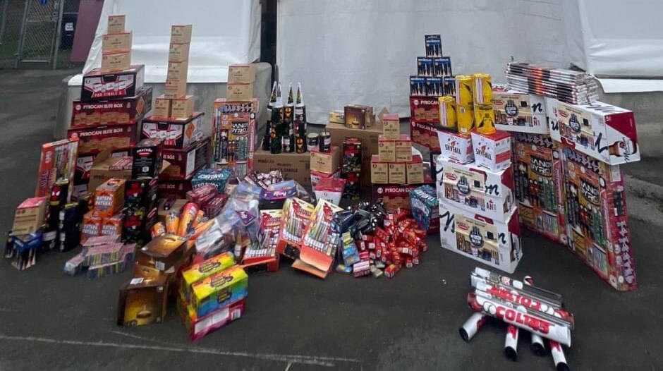 Delta police with the major fireworks seizure in North Delta where a man was stopped for selling illegal fireworks from the back of his van. Photo courtesy Delta police 