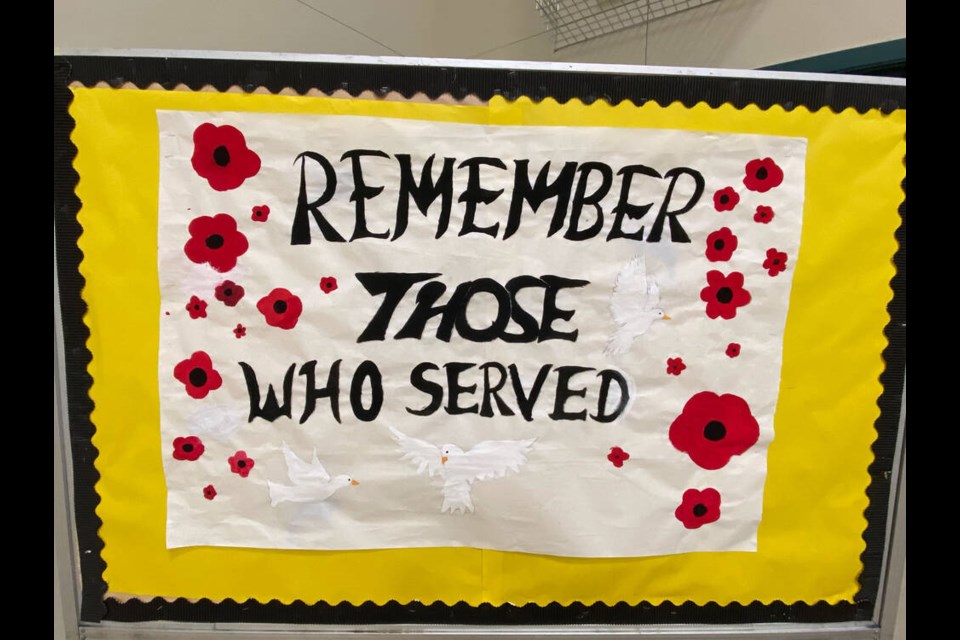 Port Guichon Elementary in Ladner have taken a unique approach to their Remembrance Day commemoration. Students have prepared various stations with different themes such as The Poppy, Dove, Paper Cranes and Fallen Soldiers in the school gym. Photos courtesy Delta School District 