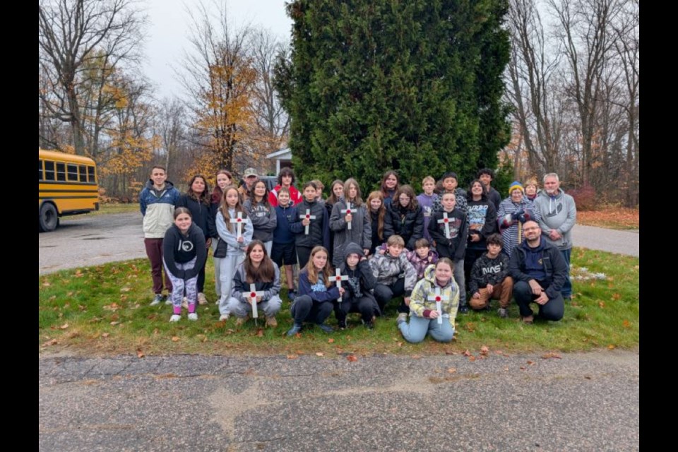 Our Lady of Fatima Catholic School experienced a day of reflection and service by laying crosses on the graves at Elliot Lake's Woodlands Cemetery