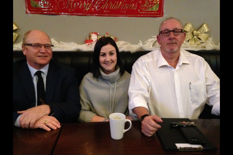 Kayla Breen-Sloane, together with her father Shayne Breen (right) who is lending his business expertise to the franchise and William Elliott, ELNOS general manager, talked about the new Swiss Chalet franchise coming to Elliot Lake at a press conference Wednesday morning. Kris Svela for ElliotLakeToday