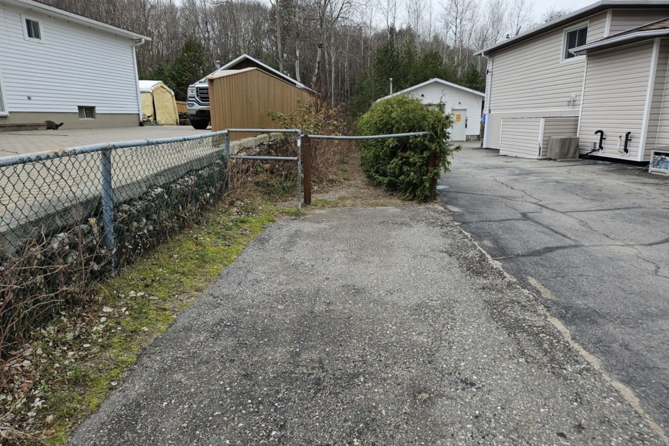 Pedestrian laneway on Paris Drive. November 15, 2024