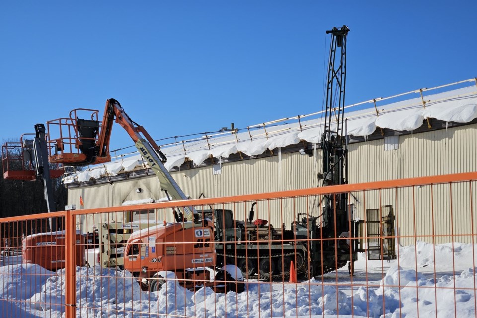 Equipment on site (R) for test micro pile boring. February 4, 2025