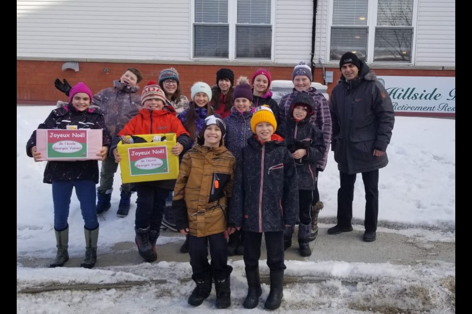 Students at École Catholique Georges Vanier brought hygiene and beauty products to the residents of Elliot Lake's nursing homes before Christmas in 2018. Provided photo. 