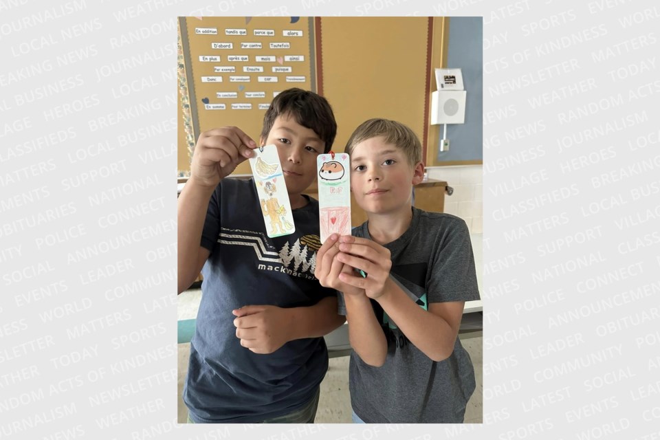 Grade 4 students make bookmarks as they delve into the world of reading