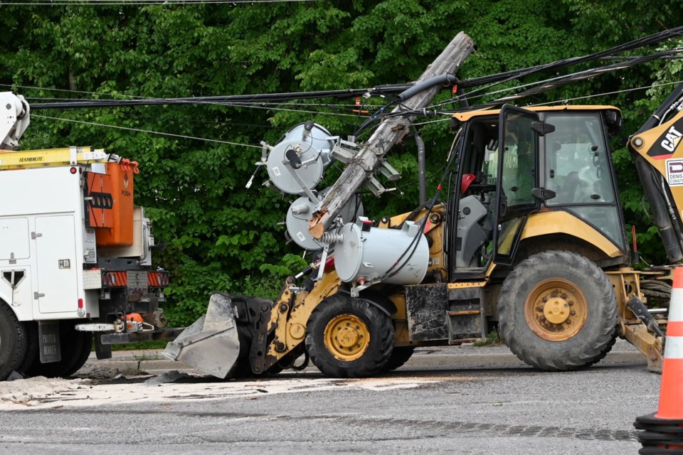 A backhoe working on the Hillside Drive project took down a hydro pole and multiple transformers on Wednesday. The city says mineral oil from the transformers entered the stormwater system