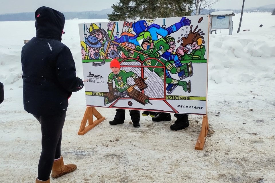 Kids enjoying games at the Spine Beach party.