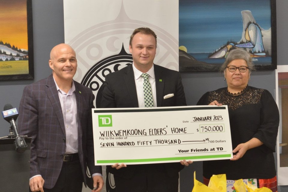 $750,000.00: (screen left) John Doris, Vice President, Commercial Banking - Sudbury, Tanner Bell, Branch Manager - Little Current, Ogimaa Kwe Rachel Manitowabi - Wiikwemkoong.