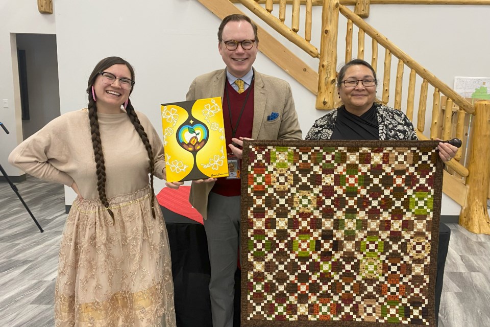 Gift Exchange, on (left) Grace Swain Indigenous artist and Communications and Media Specialist for the Maamwesying Ontario Health Team, (middle) Tim Vine, President and CEO of NSHN, (right) Carol Eshkakogan, CEO of Maamwesying North Shore Community Health Services Inc./Chair of the Maamwesying Ontario Health Team Leadership Council.