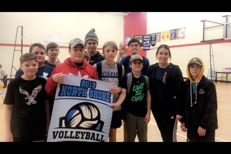    Pictured from left are members of the Lourdes boys volleyball team - Jordan Gagne, Charlie Vienneau, Adam Halman, Ayrton Longe, Cooper Melis, Landon Blair, Nolan Trudeau, Lukas Schell, Coach Jenn Smith, Tyler Stefanich. (submitted photo) 