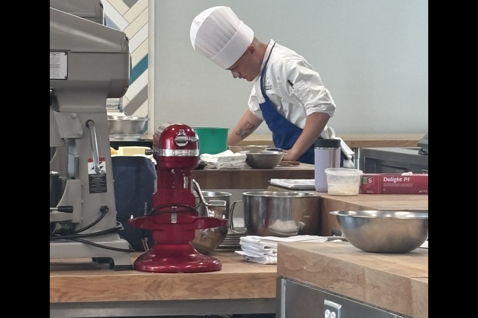 Brodie Oliver hard at work at the Conestoga College School of Hospitality & Culinary Arts culinary and baking high school competition. 
