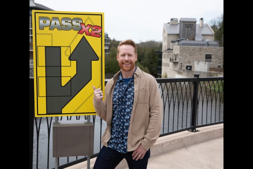 Jon Montgomery on the Jack R. MacDonald pedestrian bridge in Elora.