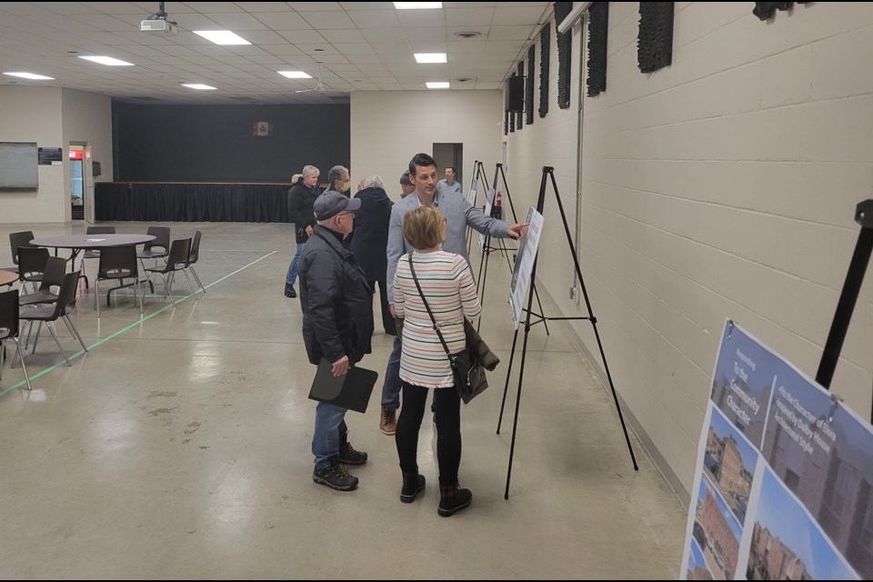 Consultant John Northcote fielding questions from attendees of the open house.