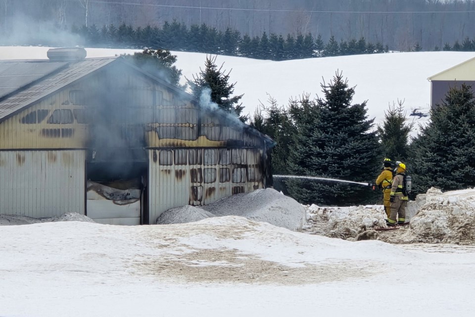 Mapleton Fire Department at the scene of a fire at a chicken barn.