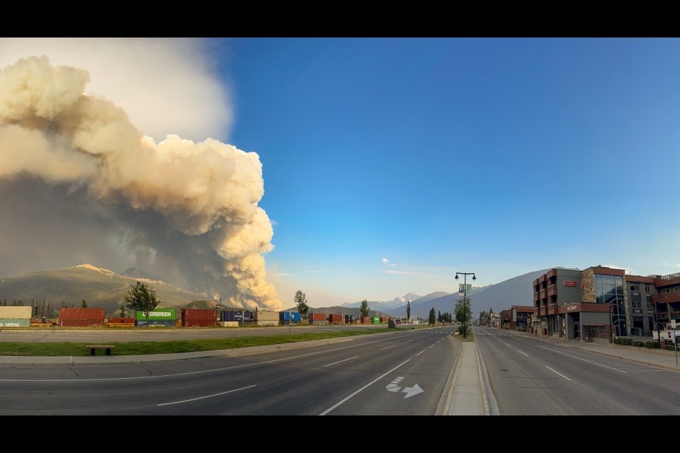 Wildfire smoke billows near the Jasper townsite on July 23, 2024.