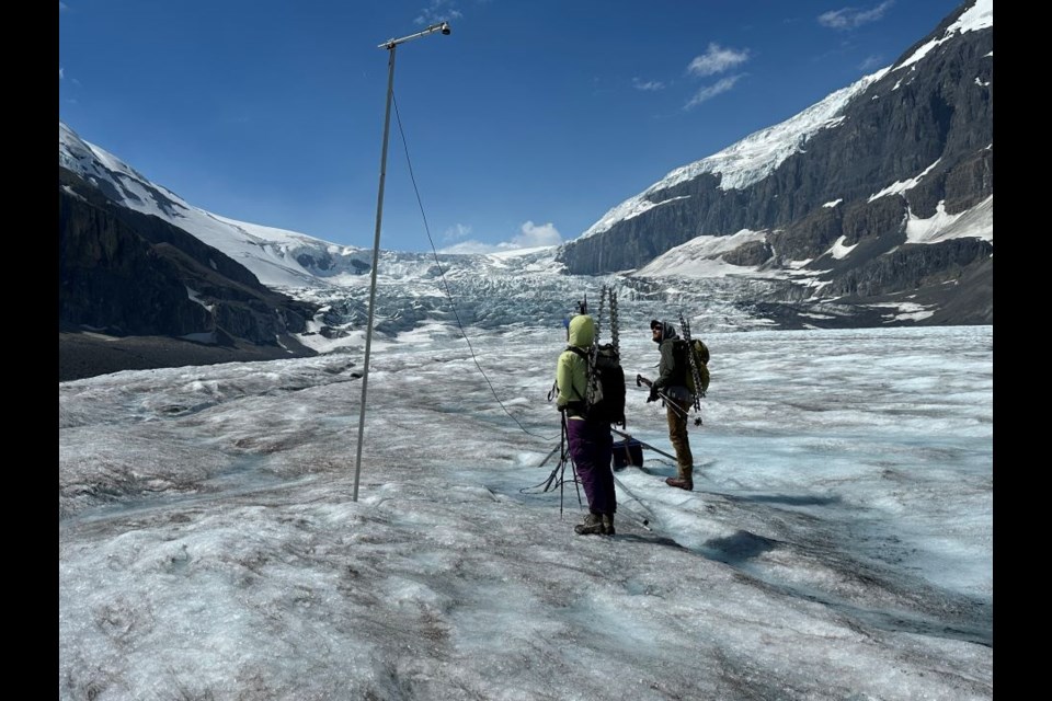 Researchers visit the Athabasca Glacier in Jasper National Park in mid-July.