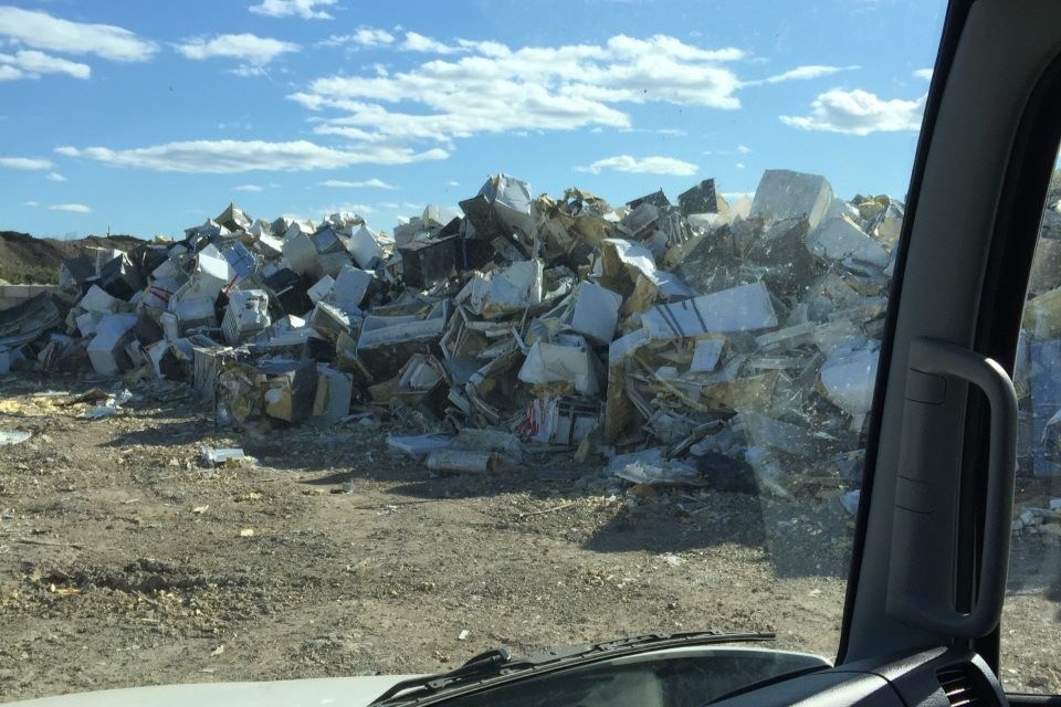 Contaminated fridges crushed at a landfill following the 2016 Fort McMurray wildfire.