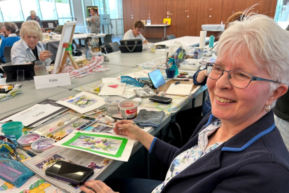 Watercolour artist Linda Tait works on some pieces during this week's Westover Artists  session at the Waterdown Seniors Centre.