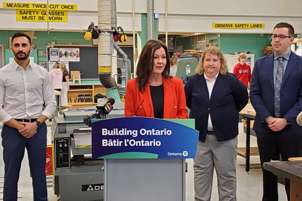 Flamborough-Glanbrook MPP Donna Skelly speaks during the announcement of the new elementary school in Waterdown April 12, as Ontario Education Minister Stephen Lecce (left) and dignitaries look on.