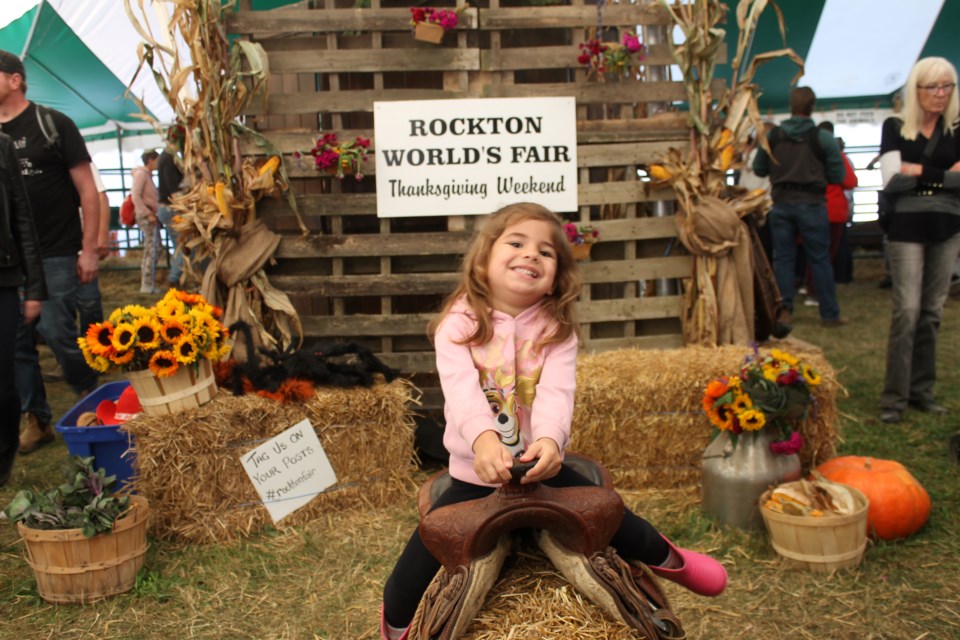 Aylah, 2, has fun in the Ag Alive tent on Saturday at Rockton World's Fair, which continues through Thanksgiving Monday.