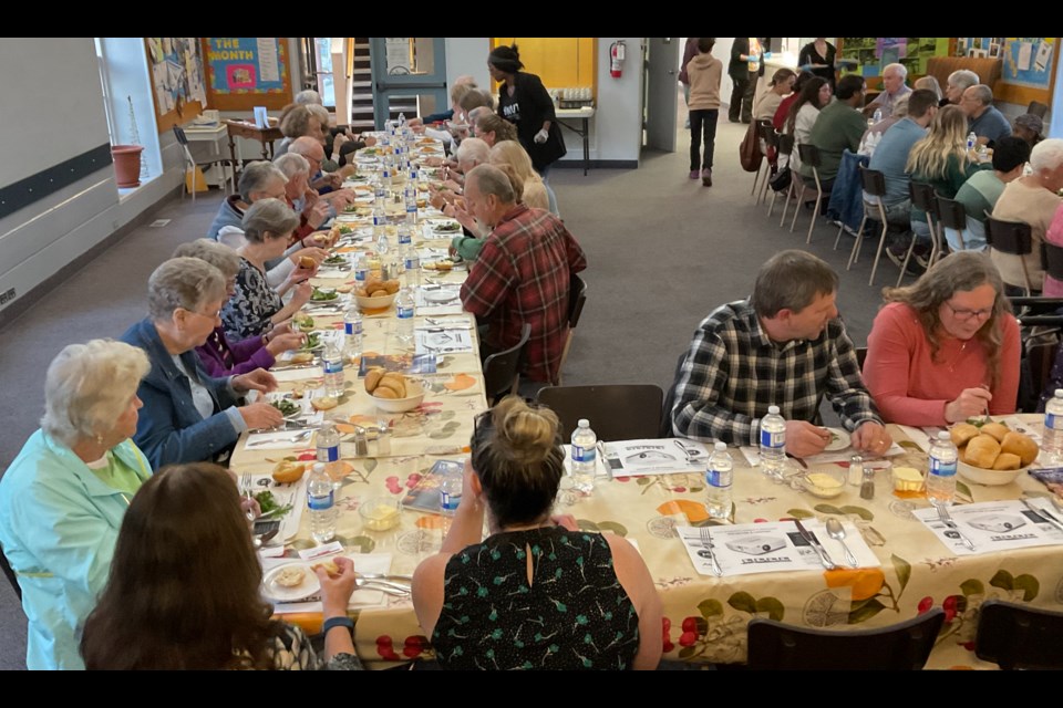 Guests enjoy a spaghetti dinner at Knox Church in Waterdown Wednesday evening.