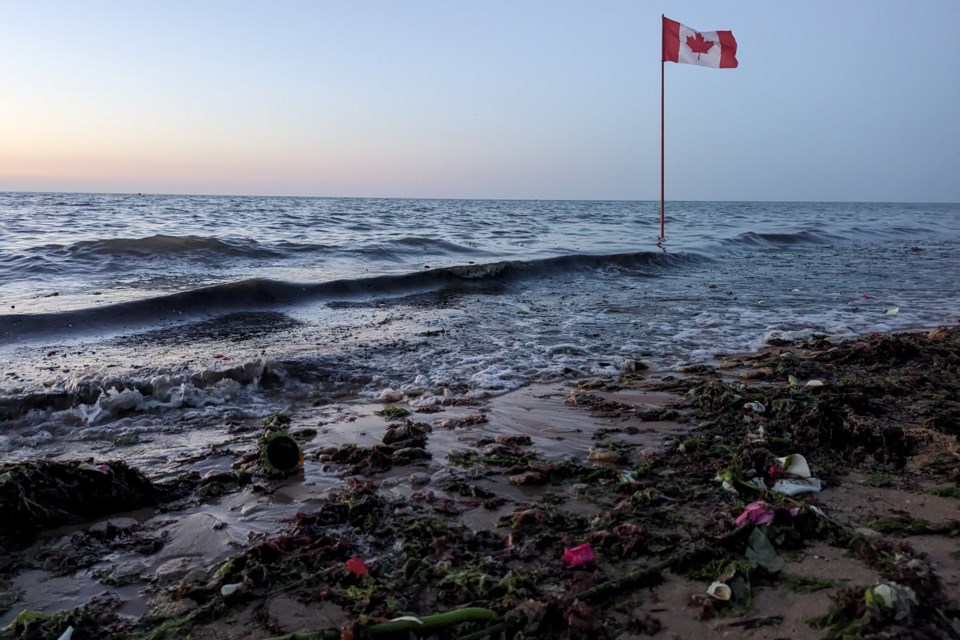 In a moving  evening ceremony on the beach at Bernières-sur-Mer, local residents entered the water and tossed flowers to the waves to mark the 80th anniversary of D-Day.