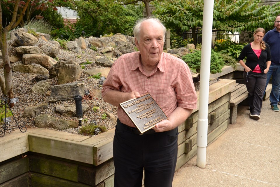 2024-11-05-rbg-scientists-jim-with-plaque-for-50-years-at-rbg-aug-2013-sup