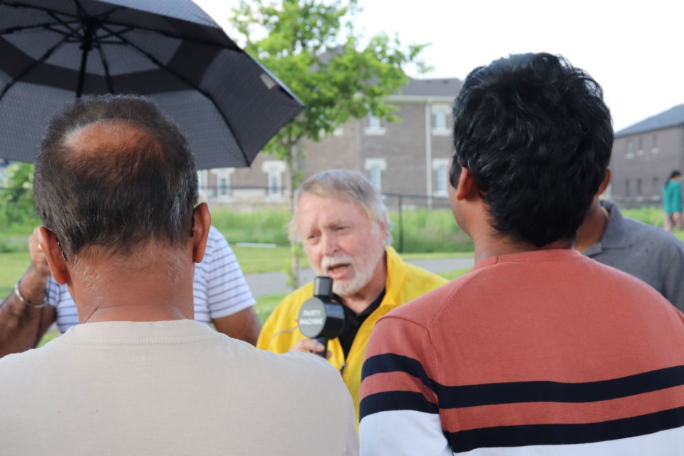 Coun. Ted McMeekin speaks to Mountainview Heights area residents about a new neighbourhood watch program. 