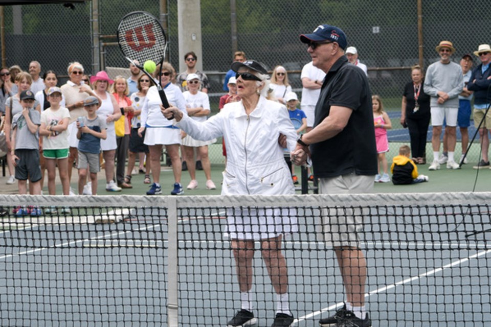 100-year-old Dundas Tennis Club member Betty Webster shows off her form on the court during the anniversary festivities June 7-8.