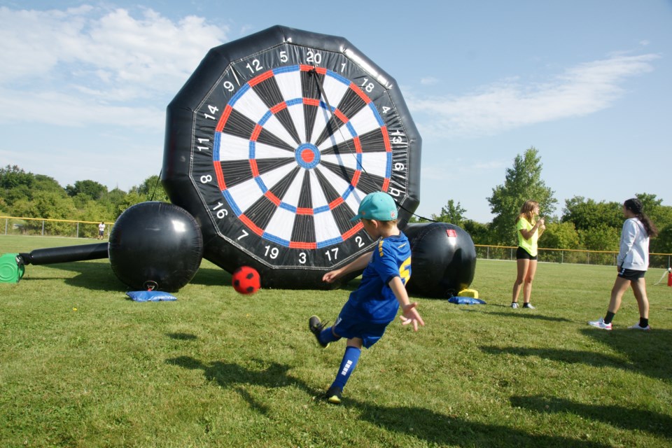 Eight-year-old Owen O'Connor of Flamborough takes aim at the target during the Flamborough Dundas Soccer Club festival at Joe Sams Park Saturday.