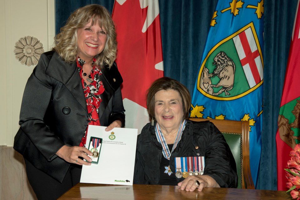 Crystal Kolt is presented with the King Charles III Coronation Medal by Manitoba Lieutentant Governor Anita
Neville in a ceremony Oct. 24. Kolt received the medal for her work promoting arts and culture in Flin Flon.