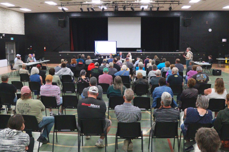 Community members are seated at a Public Utilities Board meeting at the Flin Flon Community Hall August 27. The meeting was held over the City of Flin Flon's proposed new water and sewer rate schedules, which would include higher rates for both services if approved by the board.