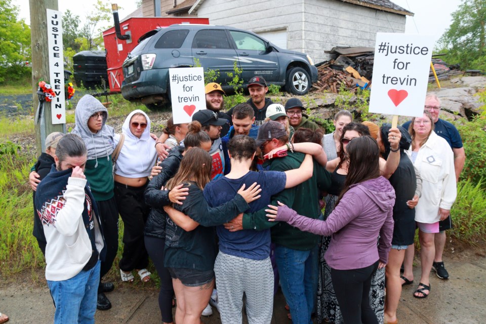 Friends and family of the late Trevin Steele gather during a memorial vigil in his memory on Green Street July 15. Steele's death is being investigated as a homicide by RCMP, but no arrests have yet been made.