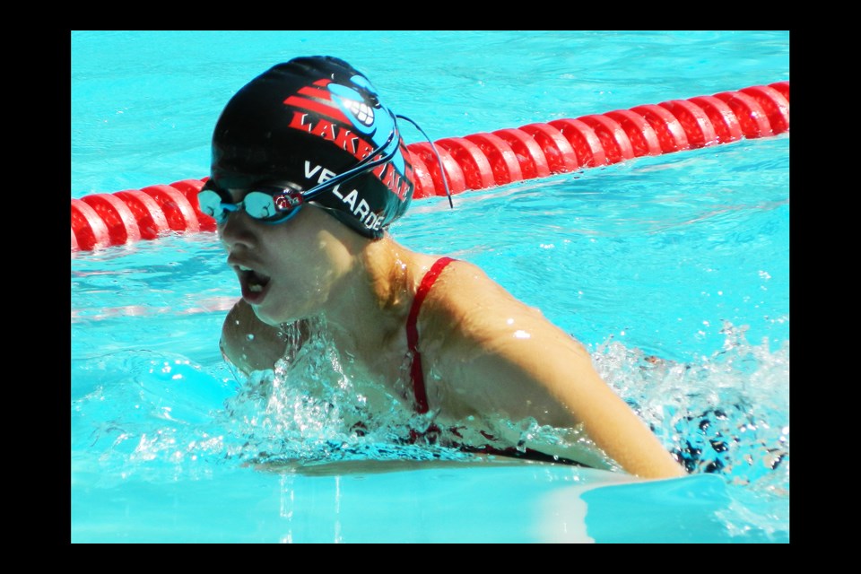 Alaura Velarde of the Lakevale Estates Dolphins swims the breaststroke during a girls race in June 15 Northern Virginia Swimming League action.