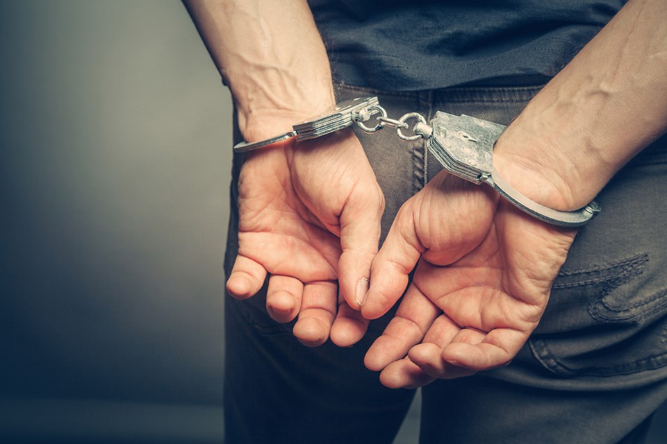 arrested-handcuffs-0193-adobe-stock