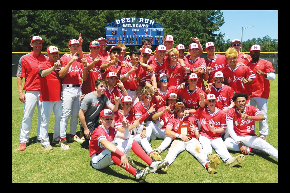 The McLean Highlanders gather with the trophy and their medals after winning the championship game of the Virginia High School League’s Class 6 state baseball tournament with a comeback victory over the South Lakes Seahawks. 