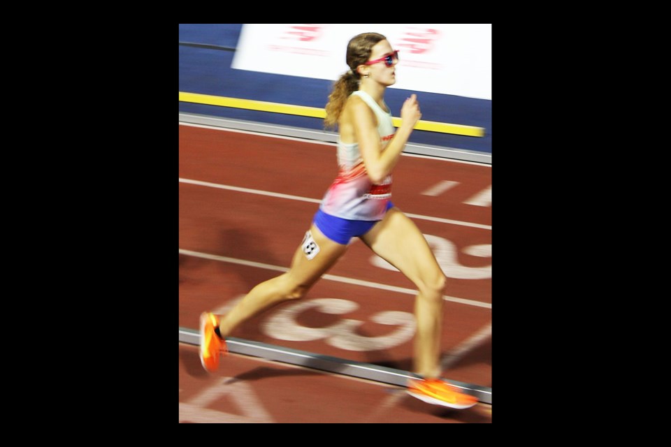 Molly Weithman run in the girls high-school championship 5,000-meter race at the recent New Balance Nationals meet.